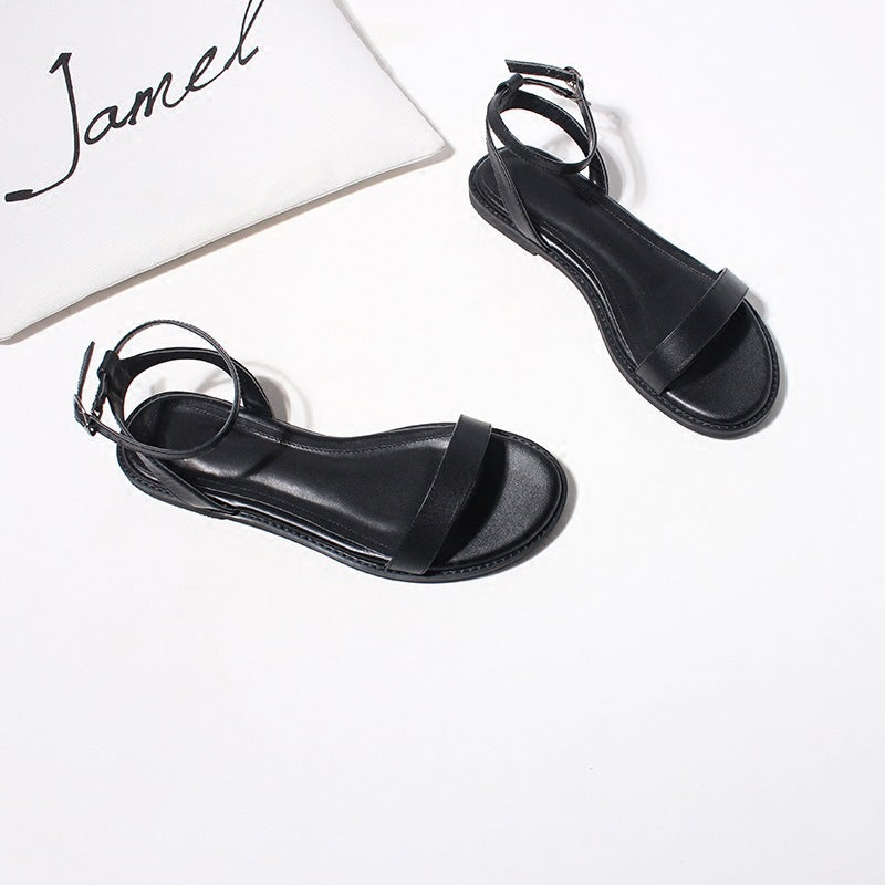 Un Mot Avec Des Sandales Plates Chaussures