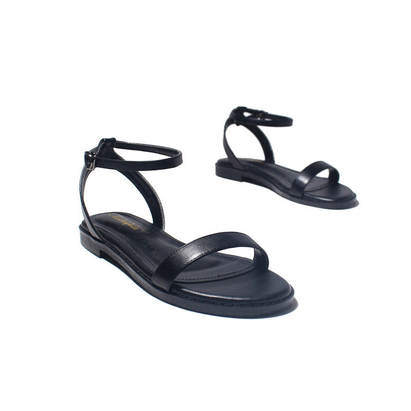 Un Mot Avec Des Sandales Plates Chaussures