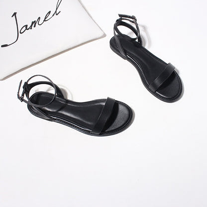 Un Mot Avec Des Sandales Plates Chaussures